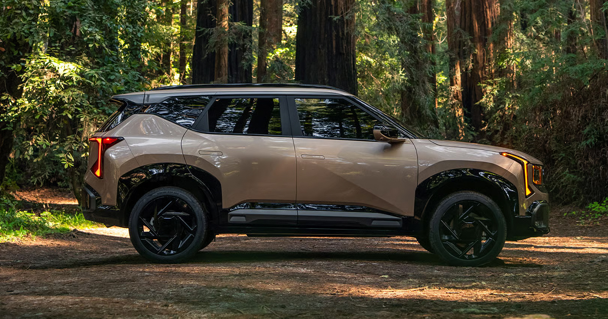 The 2027 Kia Seltos parked off-road in nature.